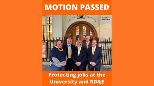 Motion Passed: Protecting Jobs at the University and RD&E. Exeter Lib Dems Cllrs in front of the Guildhall