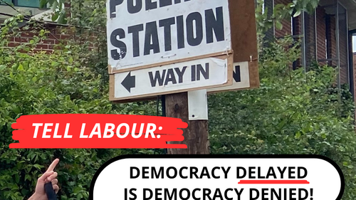 Graphic: 'Tell Labour Democracy Delayed is Democracy Denied' in front of a polling station sign