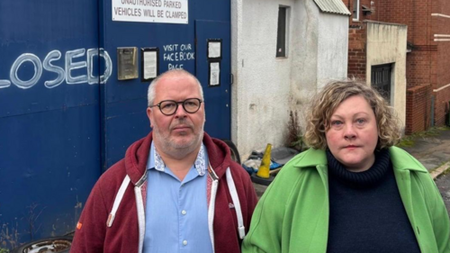 Cllr Kevin Mitchell and Cllr Tammy Palmer outisde the old Vic Street garages site, now proposed tower block